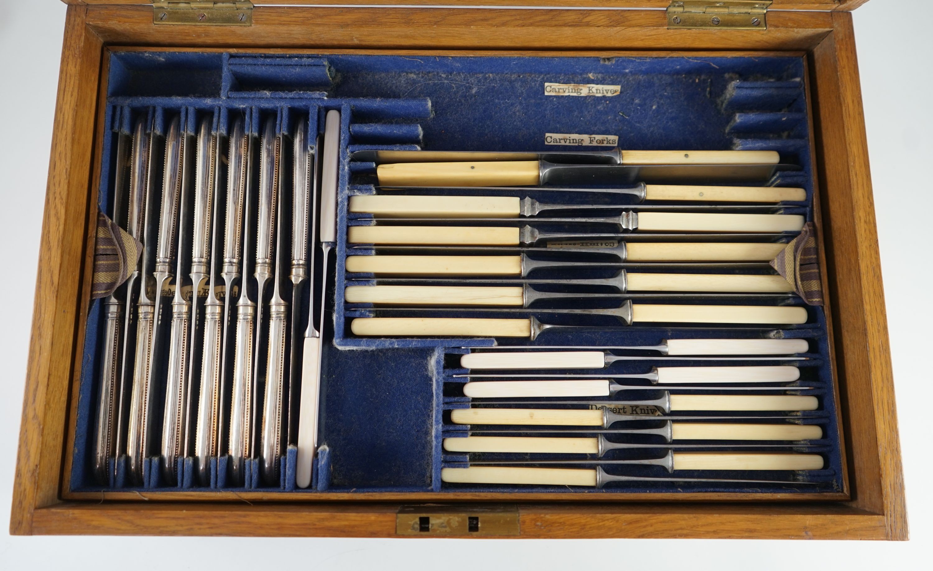 A Victorian part canteen of silver double struck Old English beaded pattern cutlery by George Adams